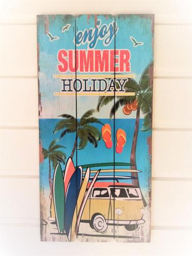 a sign for a summer holiday with a van and surfboards at Kaz'bouchons in Saint-François