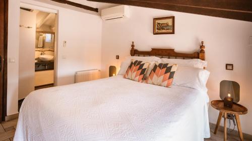Postel nebo postele na pokoji v ubytování Casa Del Maco