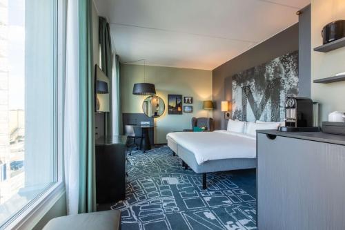 Postel nebo postele na pokoji v ubytování Radisson Blu Metropol Helsingborg