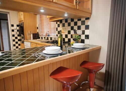 Kuchyň nebo kuchyňský kout v ubytování Glensheen