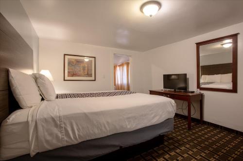 מיטה או מיטות בחדר ב-Star Route 66 Grand Canyon