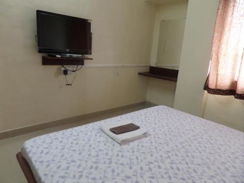 Televisyen dan/atau pusat hiburan di Cosmos Luxury Vimannagar