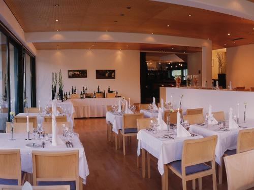 Hotel & Appartements Oberhoferにあるレストランまたは飲食店