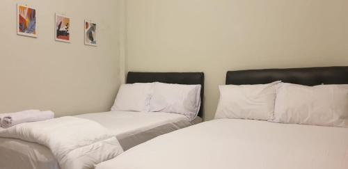 Katil atau katil-katil dalam bilik di Alexandria12 Guest House