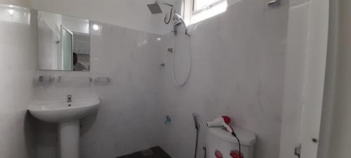 Kylpyhuone majoituspaikassa Paradise Villa