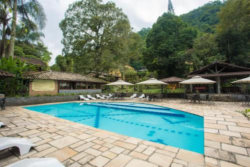A piscina localizada em Hotel da Cachoeira ou nos arredores