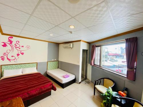 Ένα ή περισσότερα κρεβάτια σε δωμάτιο στο sunmoonlake sunflower house