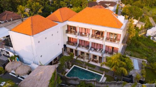 an aerial view of a house with an orange roof at Devata Giri in Uluwatu