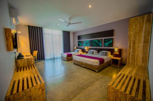 Ένα ή περισσότερα κρεβάτια σε δωμάτιο στο Skyloft Kandy by Aaradhya