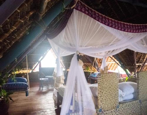 Un lugar para sentarse en Kizingo Beach Eco Lodge
