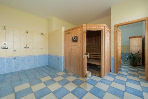 a bathroom with a shower and a toilet at Ostsee-Landhaus in Rerik