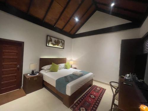 Кровать или кровати в номере Atholhu Residence
