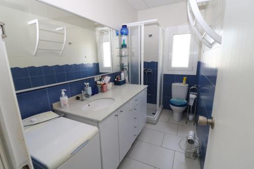 Et badeværelse på Lisboa 4 - Piso con piscina comunitaria