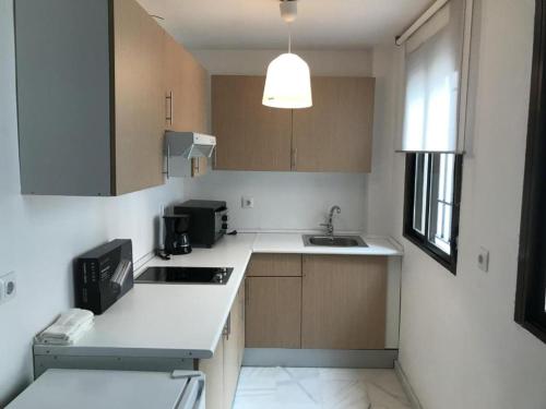Kuchyňa alebo kuchynka v ubytovaní 2.1 Apartamentos Arguiñan
