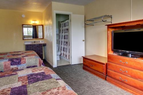 Posteľ alebo postele v izbe v ubytovaní Star Motel