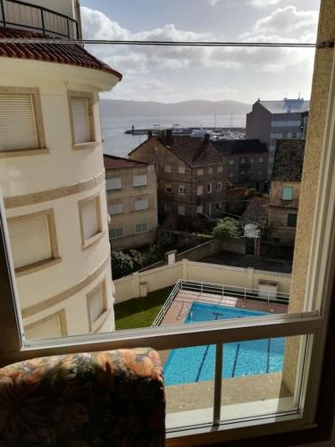 Apartamento en edificio nuevo, con piscina, vistas a la ria y al puerto, ESTANCIA MINIMA 14 noches, 