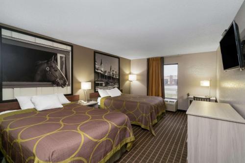 Super 8 by Wyndham Shepherdsville - Louisville South I65にあるベッド