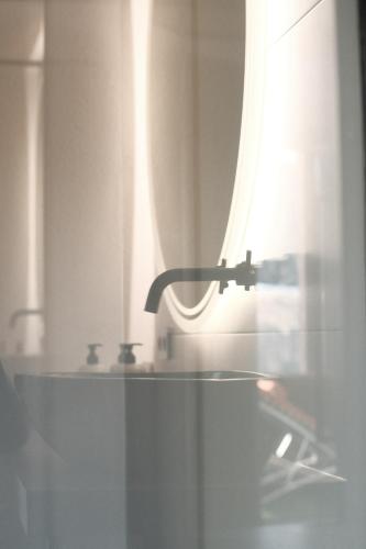 Un baño de Panoramahotel Fliesserhof
