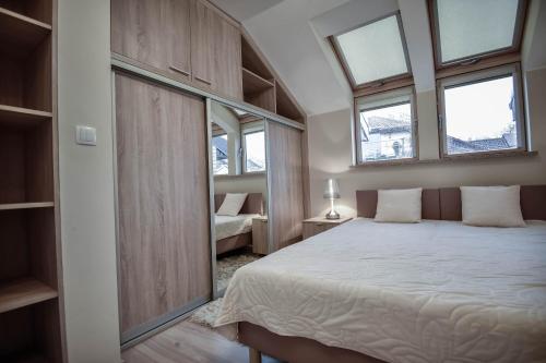 Foto Apartamenty na Wyspie - Zdrojowa 18 - Apartament z sypialnią - Parking 6