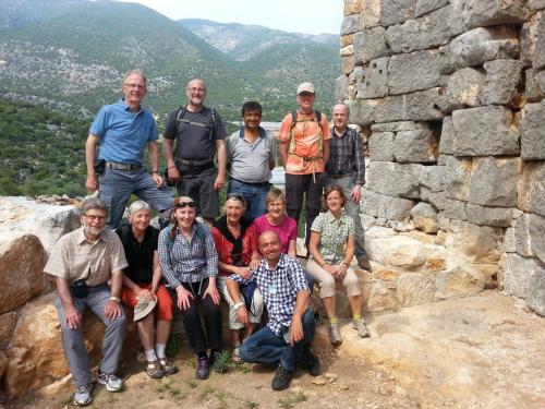 a group of people posing for a picture on a mountain at Beymelek Tas Evler in Demre