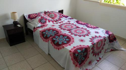 Ένα ή περισσότερα κρεβάτια σε δωμάτιο στο Villa Anse Clemence