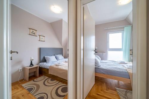 Ένα ή περισσότερα κρεβάτια σε δωμάτιο στο Zoara apartment