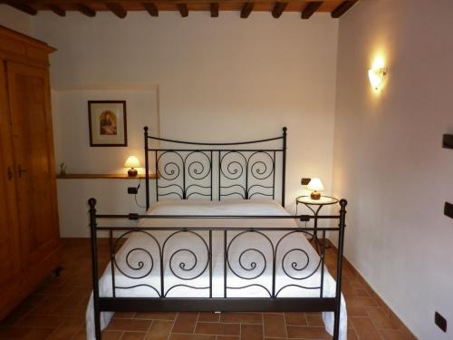 Posteľ alebo postele v izbe v ubytovaní Podere Le Grotte