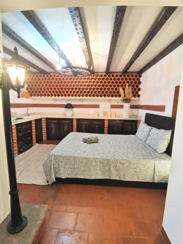 a bedroom with a bed in a room at Botanique Guesthouse in Cascais