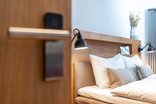 Una cama o camas en una habitación de Apart Hotel Wasserturm