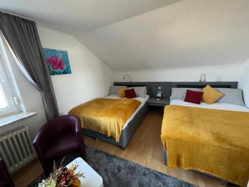 Postel nebo postele na pokoji v ubytování Strandnest Büsum Ferienhaus
