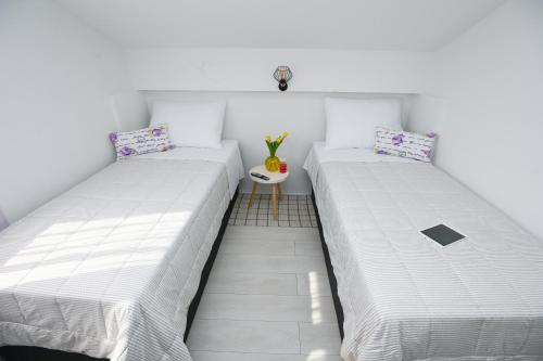 En eller flere senge i et værelse på Split Old Town Apartment