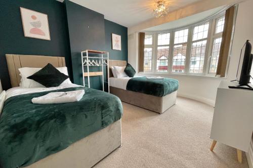 Krevet ili kreveti u jedinici u okviru objekta 3Bed Coventry Gem - The Perfect Home Away From Home