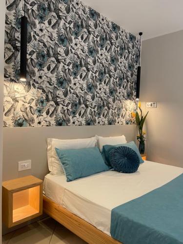A bed or beds in a room at Sapore Di Sale Accommodation Tropea