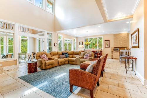a large living room with a couch and chairs at Bufflehead 3 in Kiawah Island