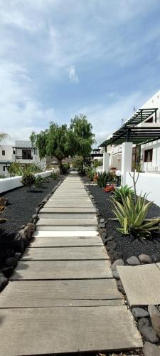 a walkway in front of a house at Villa Harmony in Charco del Palo