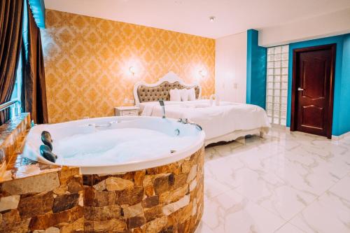 Katil atau katil-katil dalam bilik di Lima Central Design Hotel Spa & Club