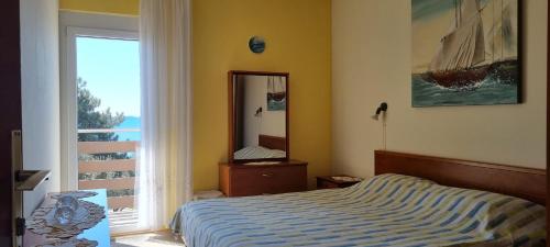 Säng eller sängar i ett rum på Apartments Katica