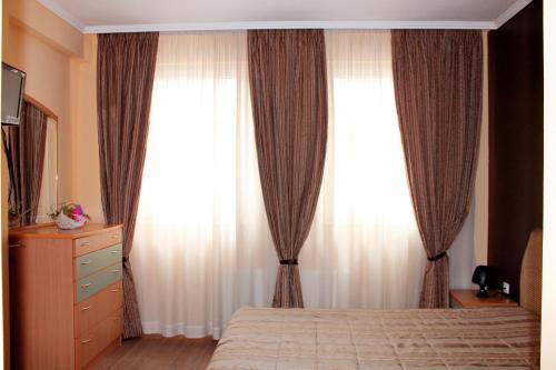 Кровать или кровати в номере Venice Apartments