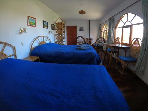 Кровать или кровати в номере Hotel La Cupula