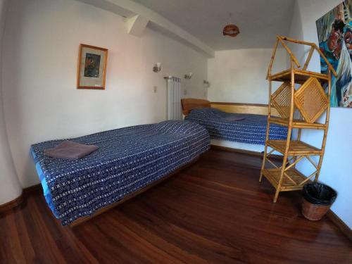Кровать или кровати в номере Hotel La Cupula