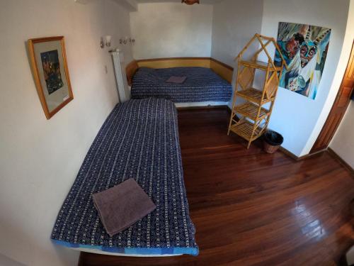 Кровать или кровати в номере Hotel La Cupula