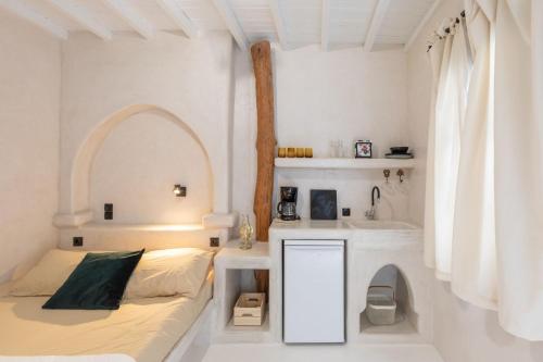 Tempat tidur dalam kamar di Cassaris Mykonos