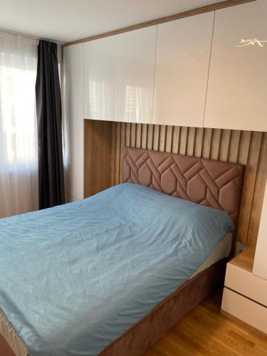 Кровать или кровати в номере Apartment 5 Star