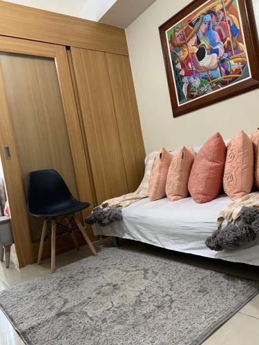Postel nebo postele na pokoji v ubytování Best Value Q Condo1439