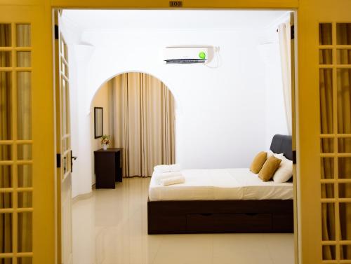 Ein Bett oder Betten in einem Zimmer der Unterkunft Kandy view resort