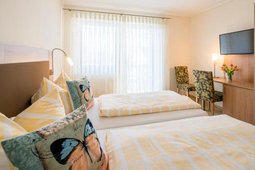Hotel Goldener Löweにあるベッド