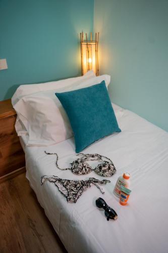 Postel nebo postele na pokoji v ubytování Hotel New Genziana