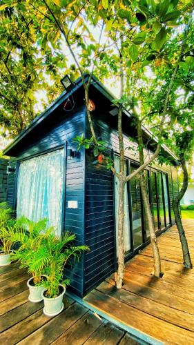 Un jardín fuera de Kampot Riverfront Boutique