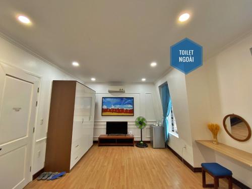 an office with a sign that reads tourist museum at Hue Crown Boutique best hotel in Hue