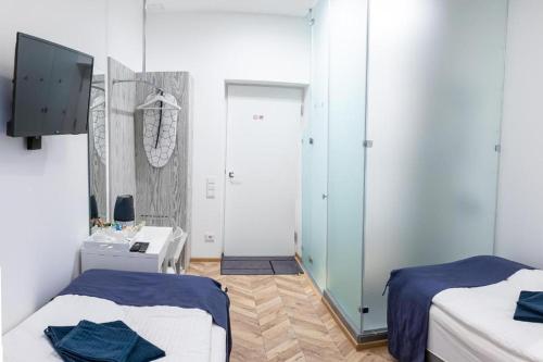 Кровать или кровати в номере HOT SPOT Vilnius Apartments!